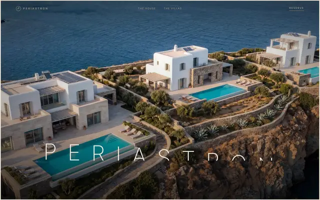 Screenshot from Periastron: aerial photo of three villas with pools above the sea